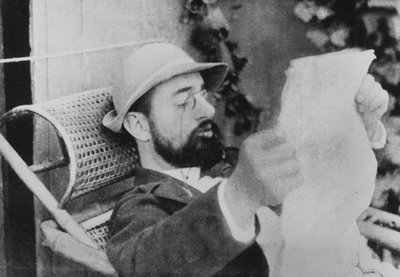French Painter Henri De Toulouse-Lautrec Reading Paper by Unknown